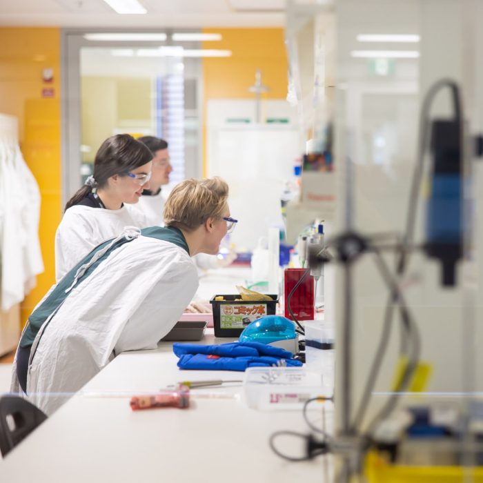 School of Medical Sciences SOMS lab photo Scientists working at lab bench