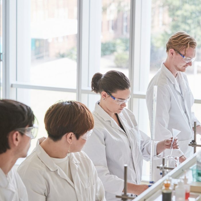 Students experimenting in a Chemical Science laboratory. Students working on experiments in the Chemical Science building UNSW.