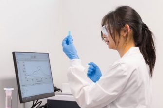 Julia Chov Julia Chov working in a lab